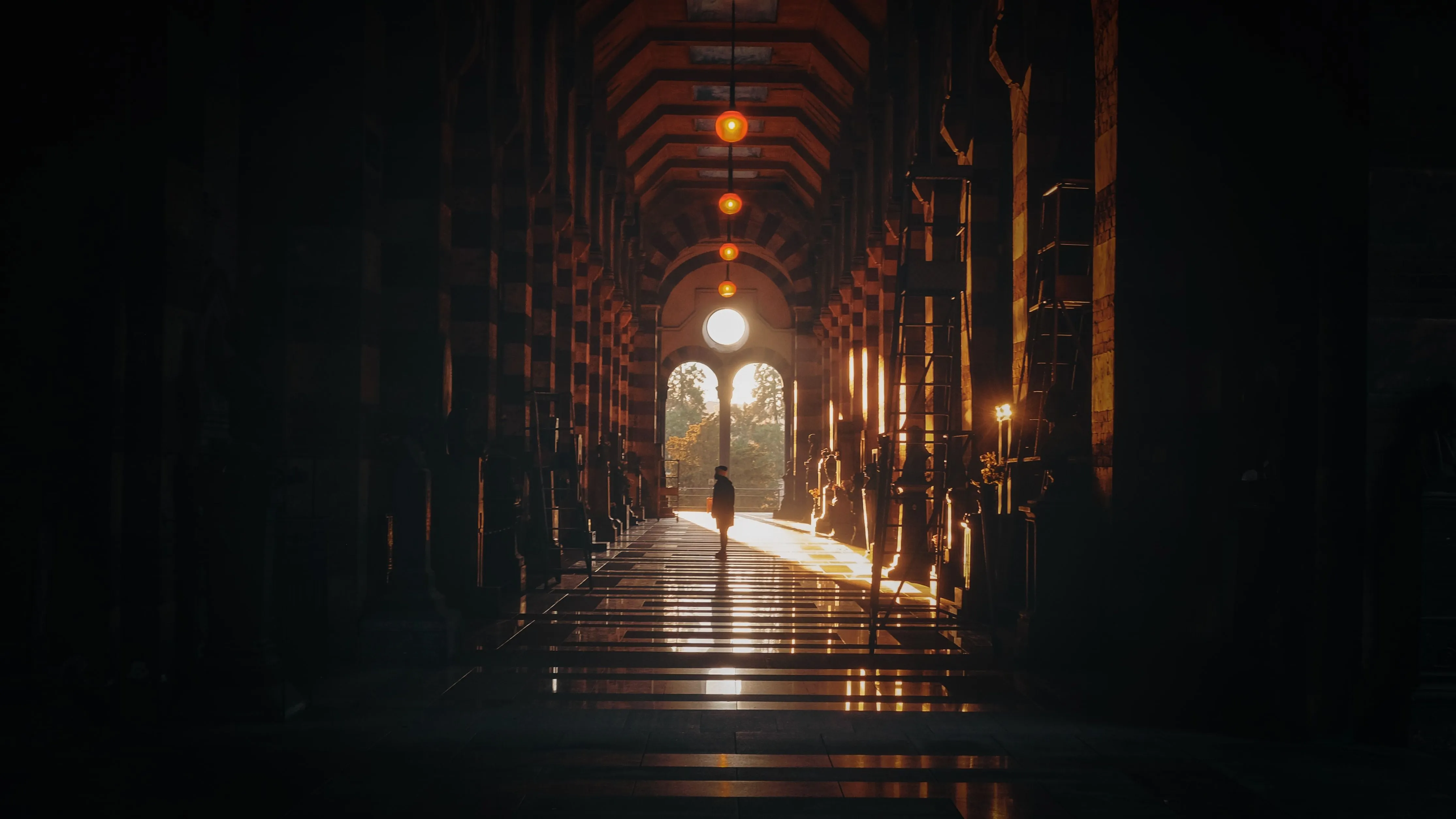 People walking on sidewalk during night time